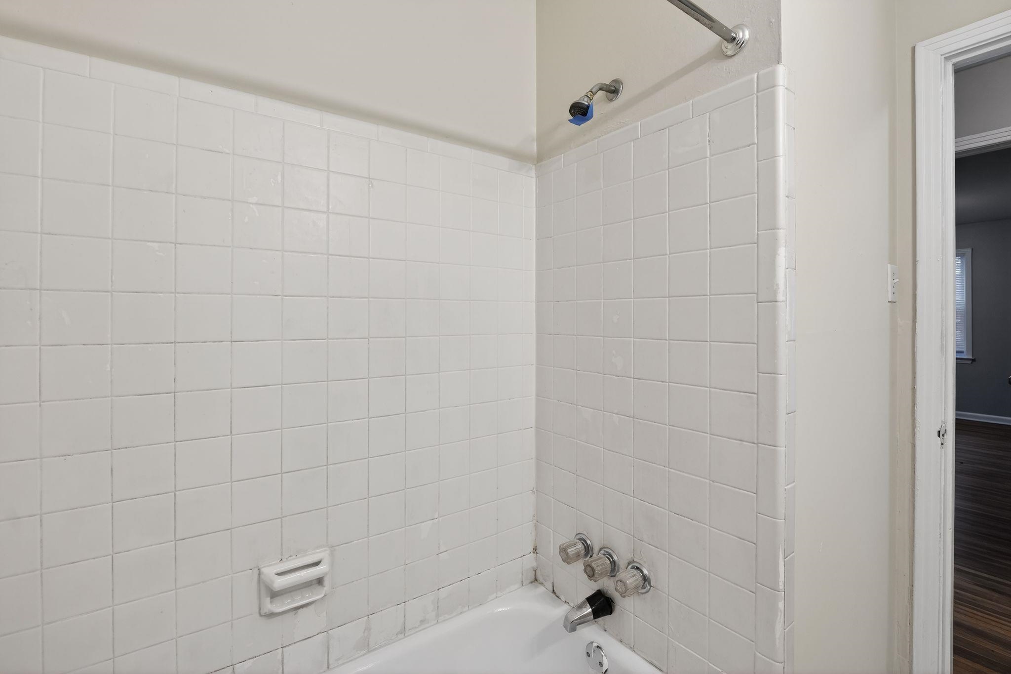 3150 Parham Street Memphis, TN 38127 - Photo 29 of 33 a bathroom with a bathtub