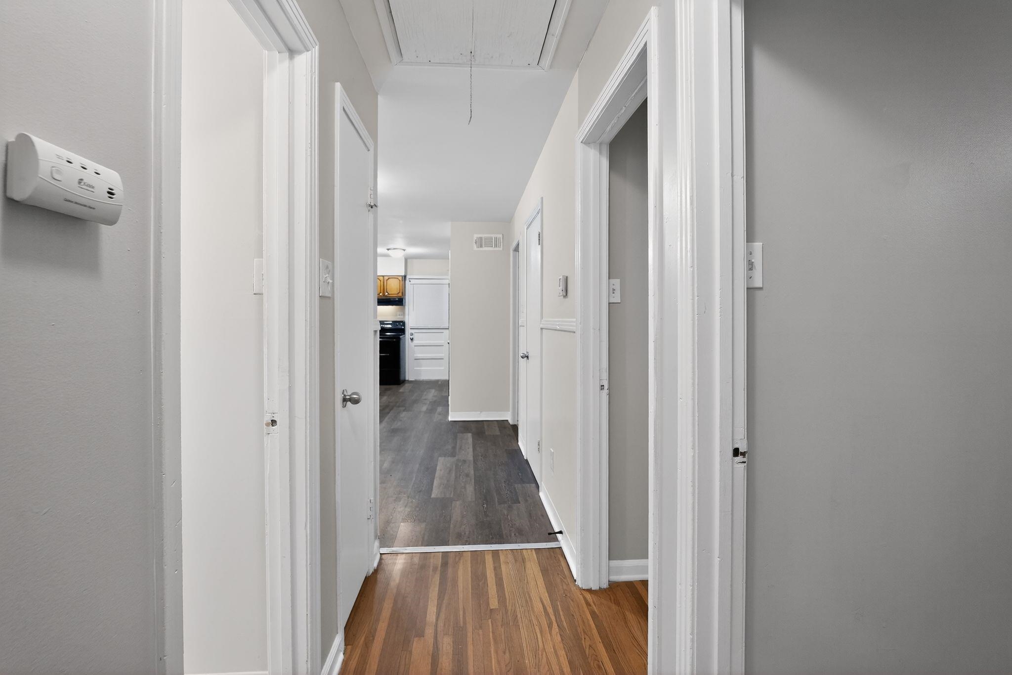 3150 Parham Street Memphis, TN 38127 - Photo 33 of 33 a view of a hallway with wooden floor