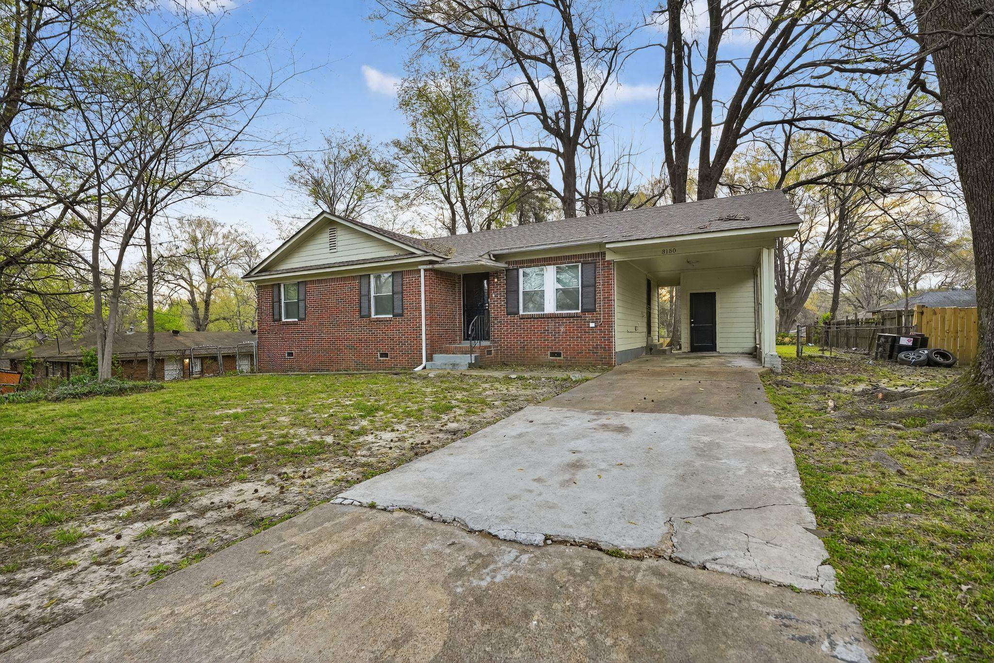 3150 Parham Street Memphis, TN 38127 - Photo 4 of 33 front view of a house with a yard