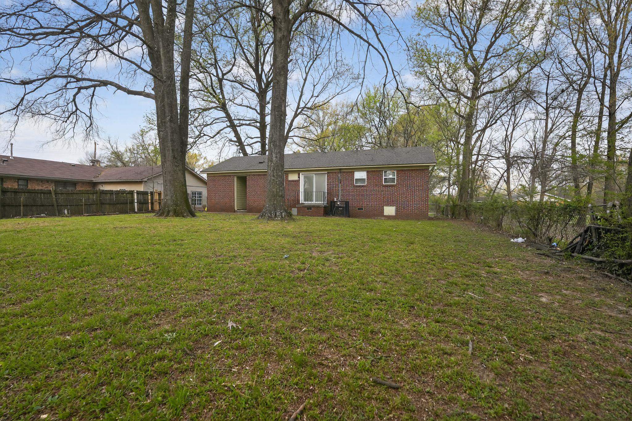 3150 Parham Street Memphis, TN 38127 - Photo 7 of 33 a view of a house with a yard