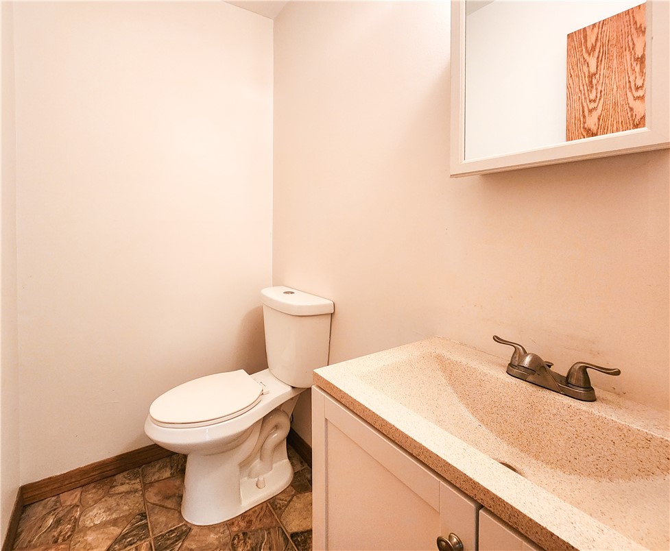 233 13th Street Southwest Vero Beach, FL 32962 - Photo 11 of 20 a bathroom with a sink and a toilet