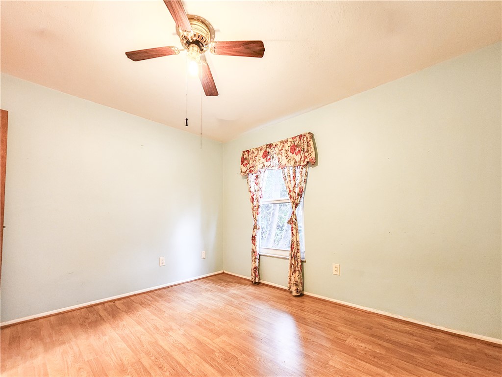 233 13th Street Southwest Vero Beach, FL 32962 - Photo 13 of 20 a view of empty room with ceiling fan
