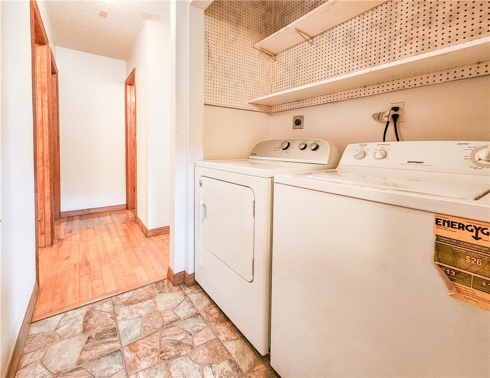 233 13th Street Southwest Vero Beach, FL 32962 - Photo 9 of 20 a utility room with dryer and washer