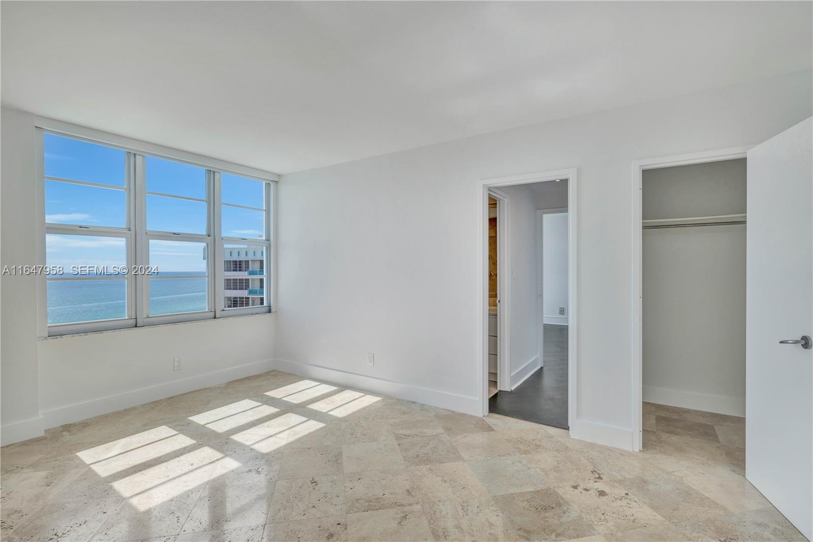 5151 Collins Avenue, Unit 1627 Miami Beach, FL 33140 - Photo 16 of 28 a view of empty room with windows