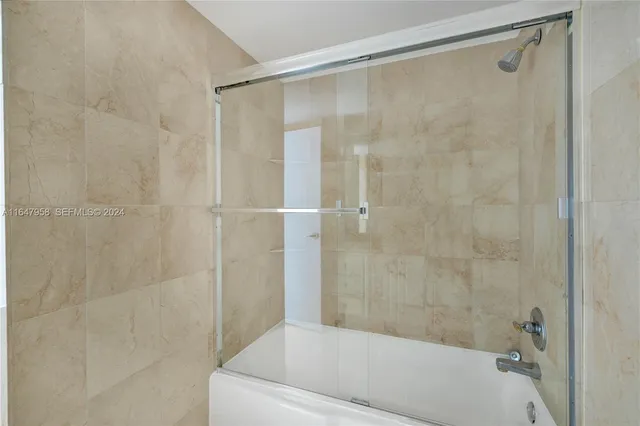 a backyard of a house with lots of green space and fountain