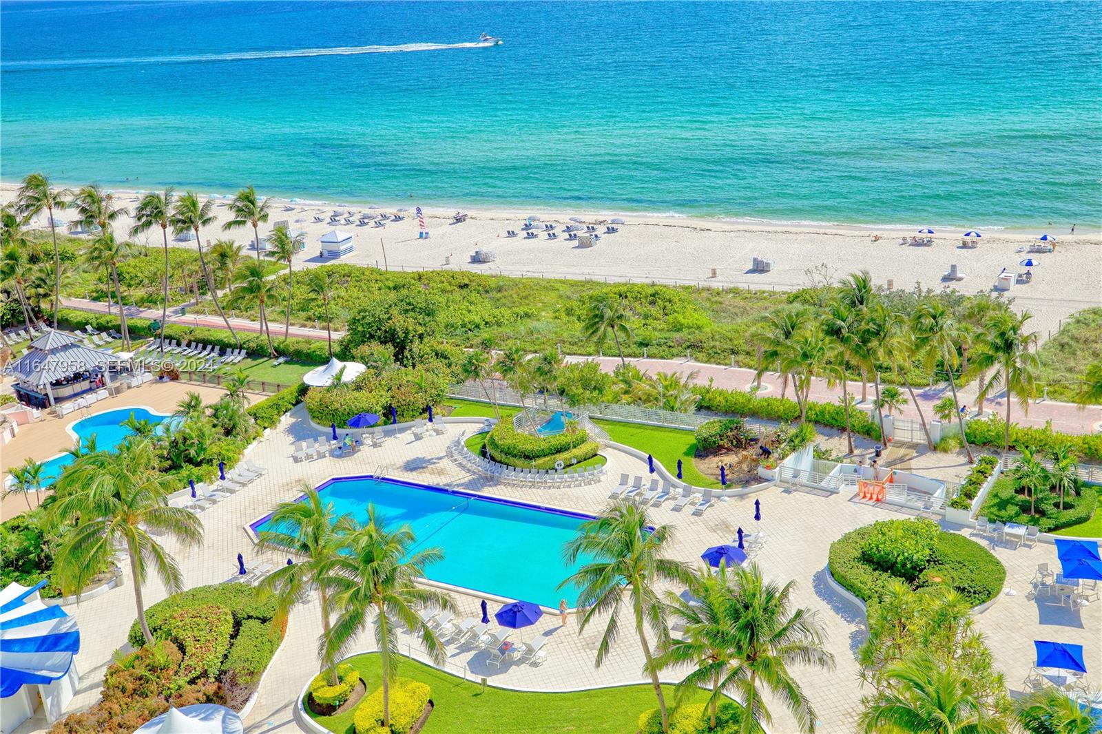 5151 Collins Avenue, Unit 1627 Miami Beach, FL 33140 - Photo 5 of 28 a view of swimming pool with a yard