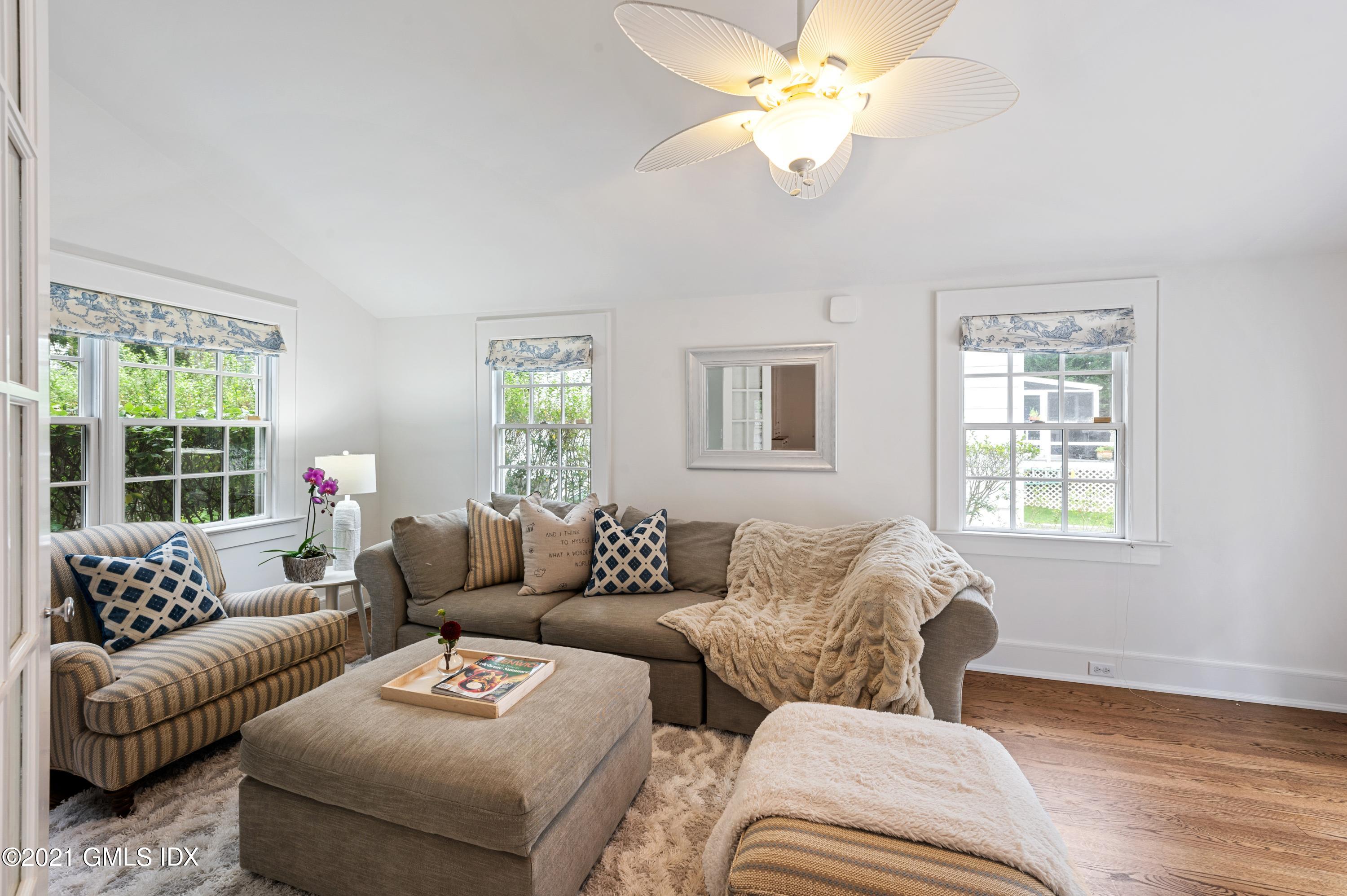 32 Perryridge Road Greenwich, CT 06830 - Photo 11 of 29 a living room with furniture and a large window