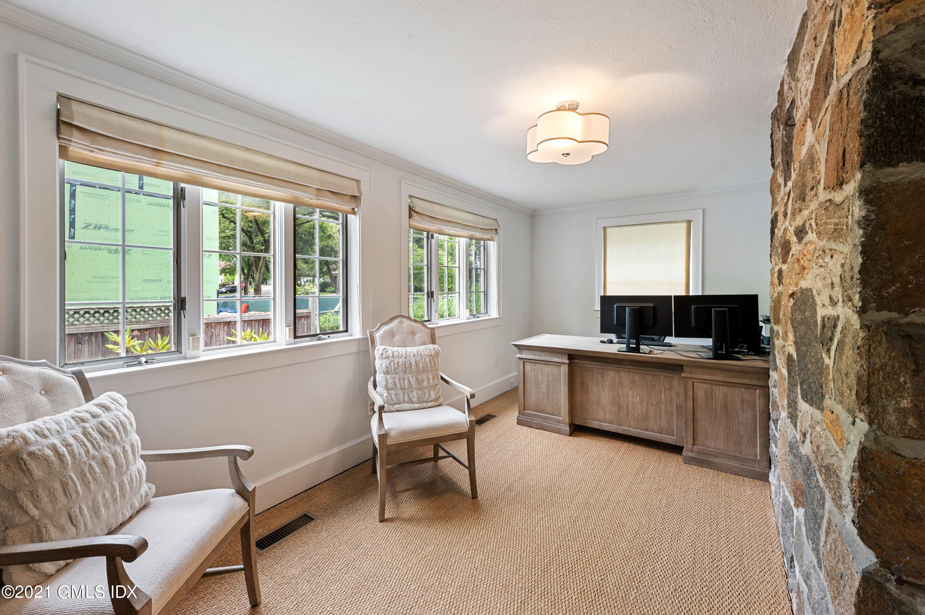 32 Perryridge Road Greenwich, CT 06830 - Photo 5 of 29 a living room with furniture and a large window