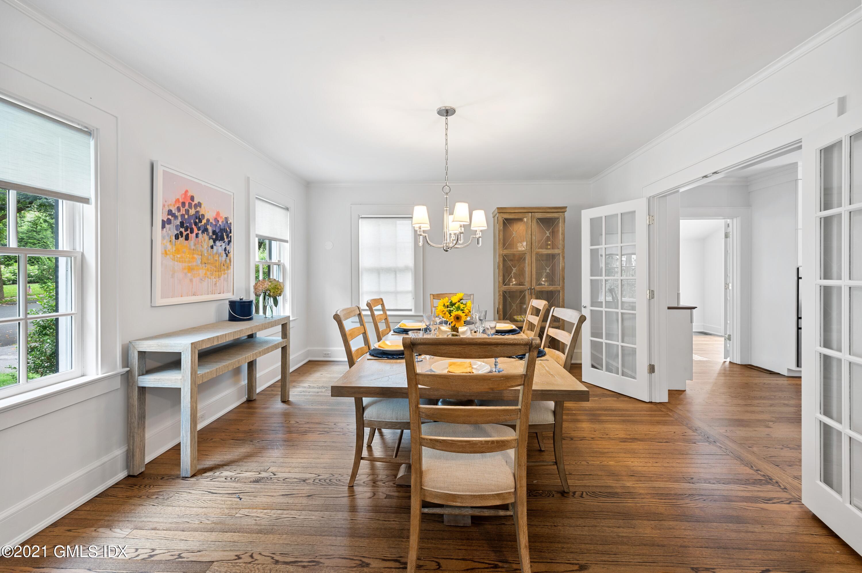 32 Perryridge Road Greenwich, CT 06830 - Photo 6 of 29 a view of a dining room with furniture window and wooden floor
