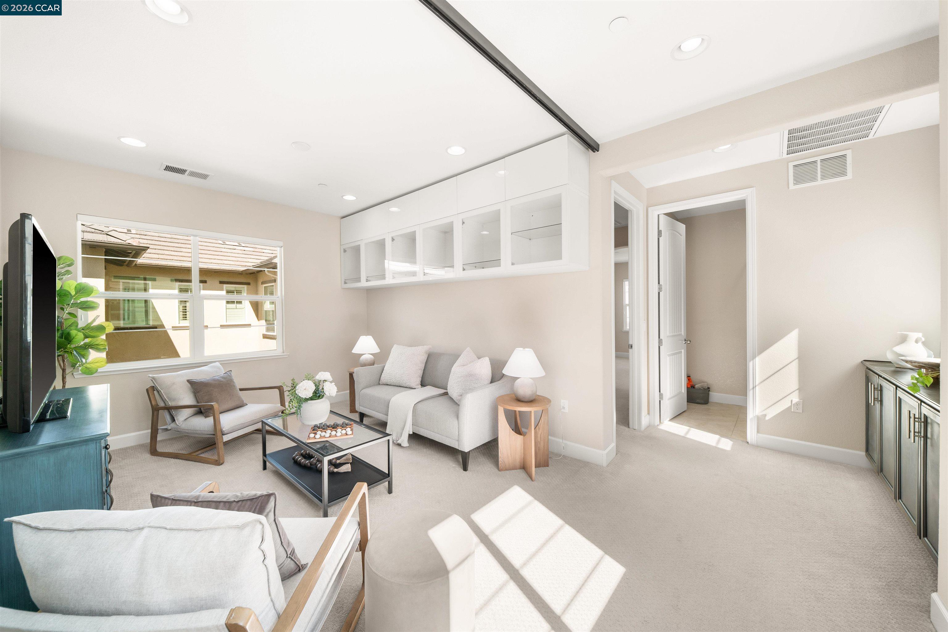 2026 Poinsettia Street San Ramon, CA 94582 - Photo 20 of 26 a living room with furniture and a large window