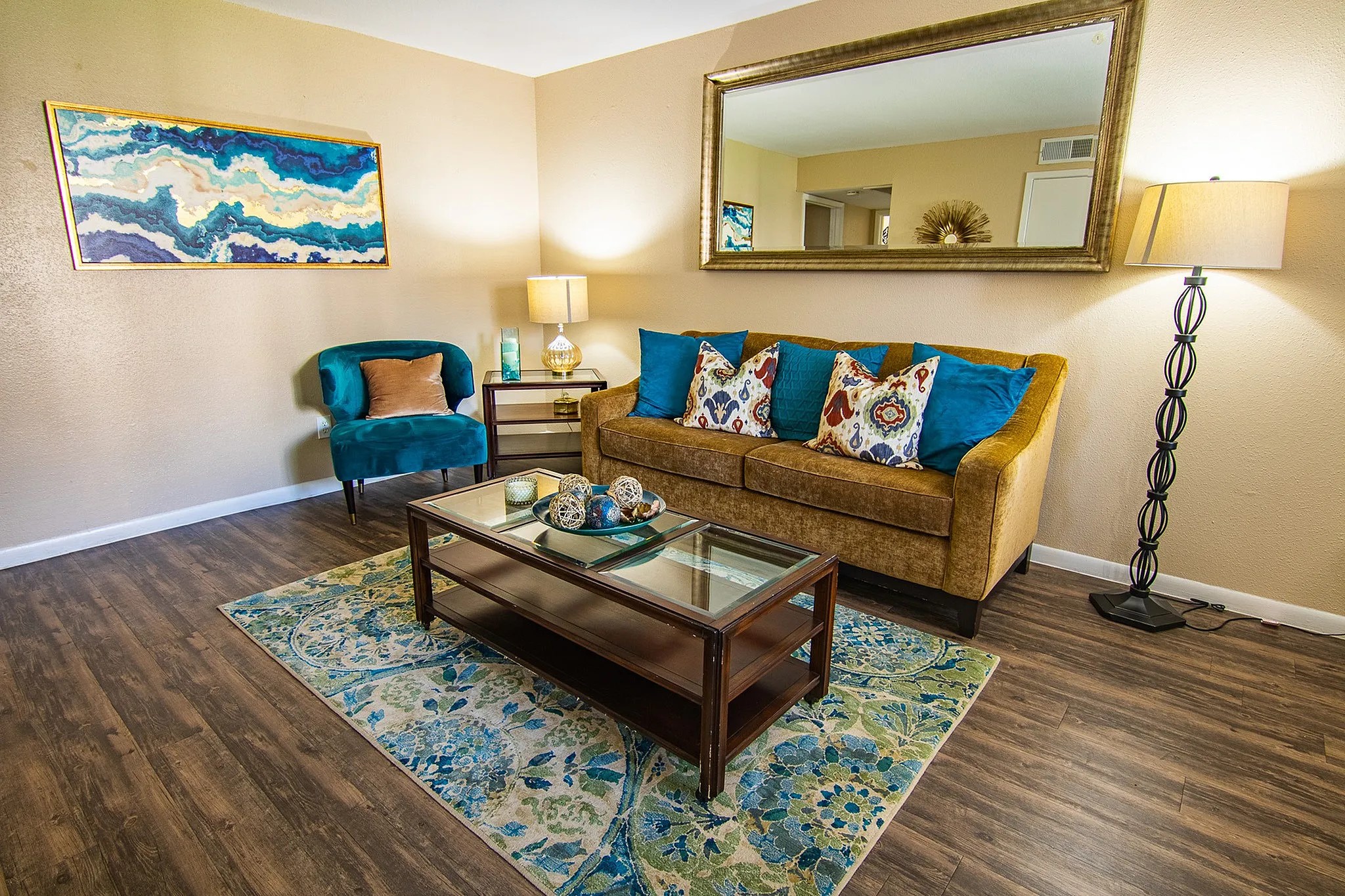 15100 Golden Eagle Drive, Unit 203 Humble, TX 77396 - Photo 6 of 22 a living room with furniture and wooden floor