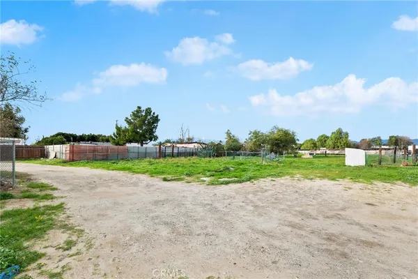 a view of a lake from a yard