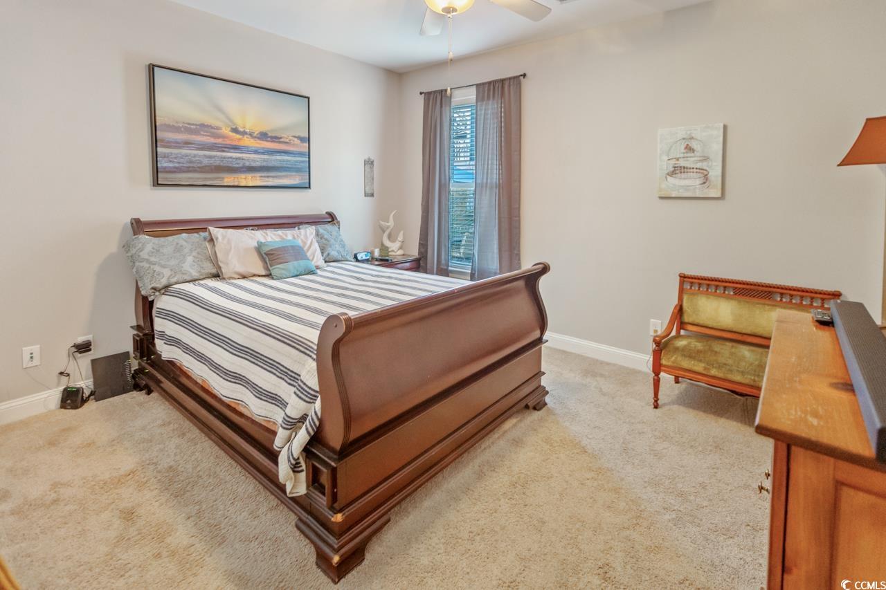 3887 Spanner Way Murrells Inlet, SC 29576 - Photo 26 of 32 Bedroom featuring light carpet and ceiling fan