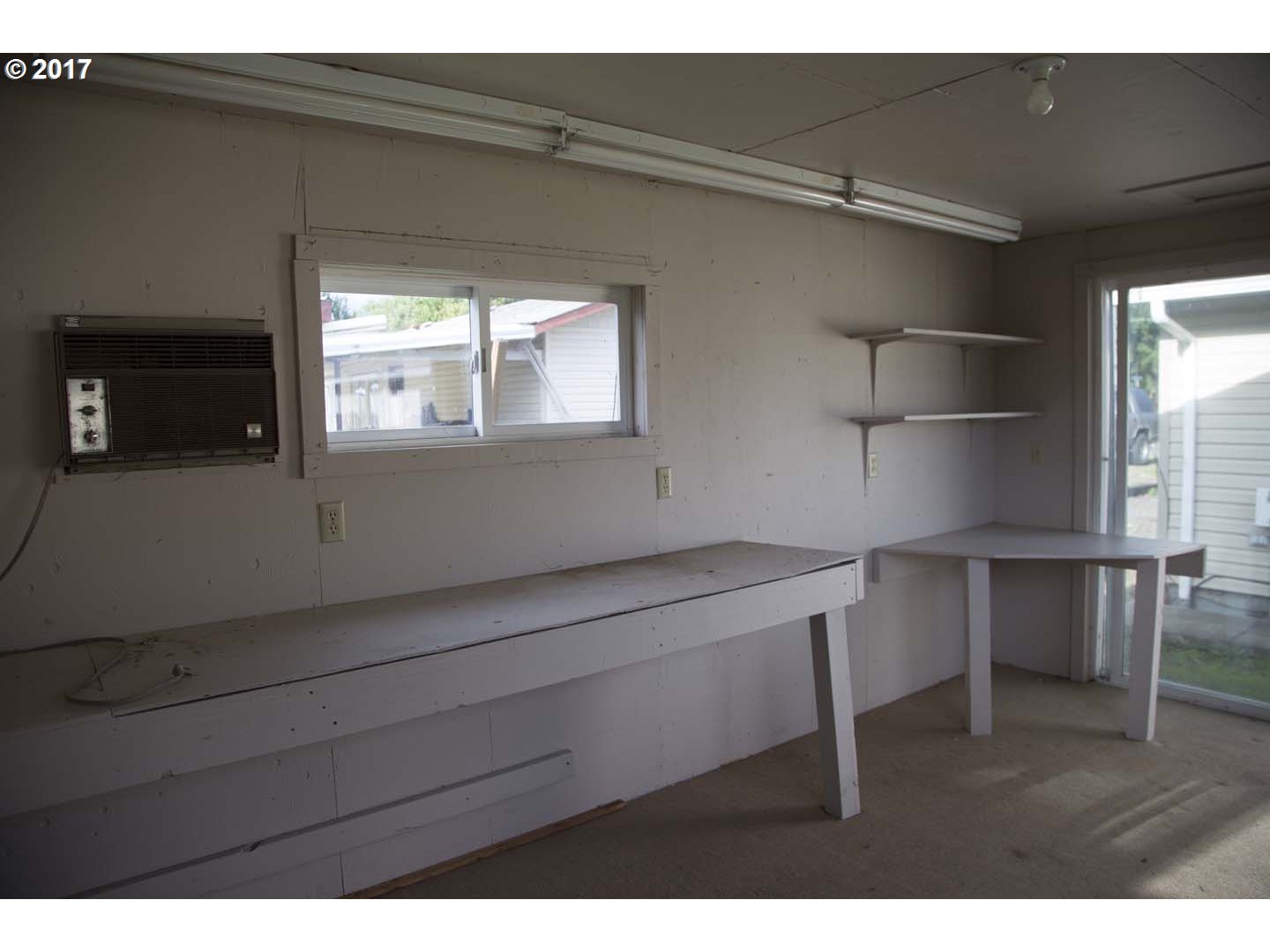 20835 Butteville Road Northeast Donald, OR 97020 - Photo 14 of 14 a kitchen with a wooden floor and window