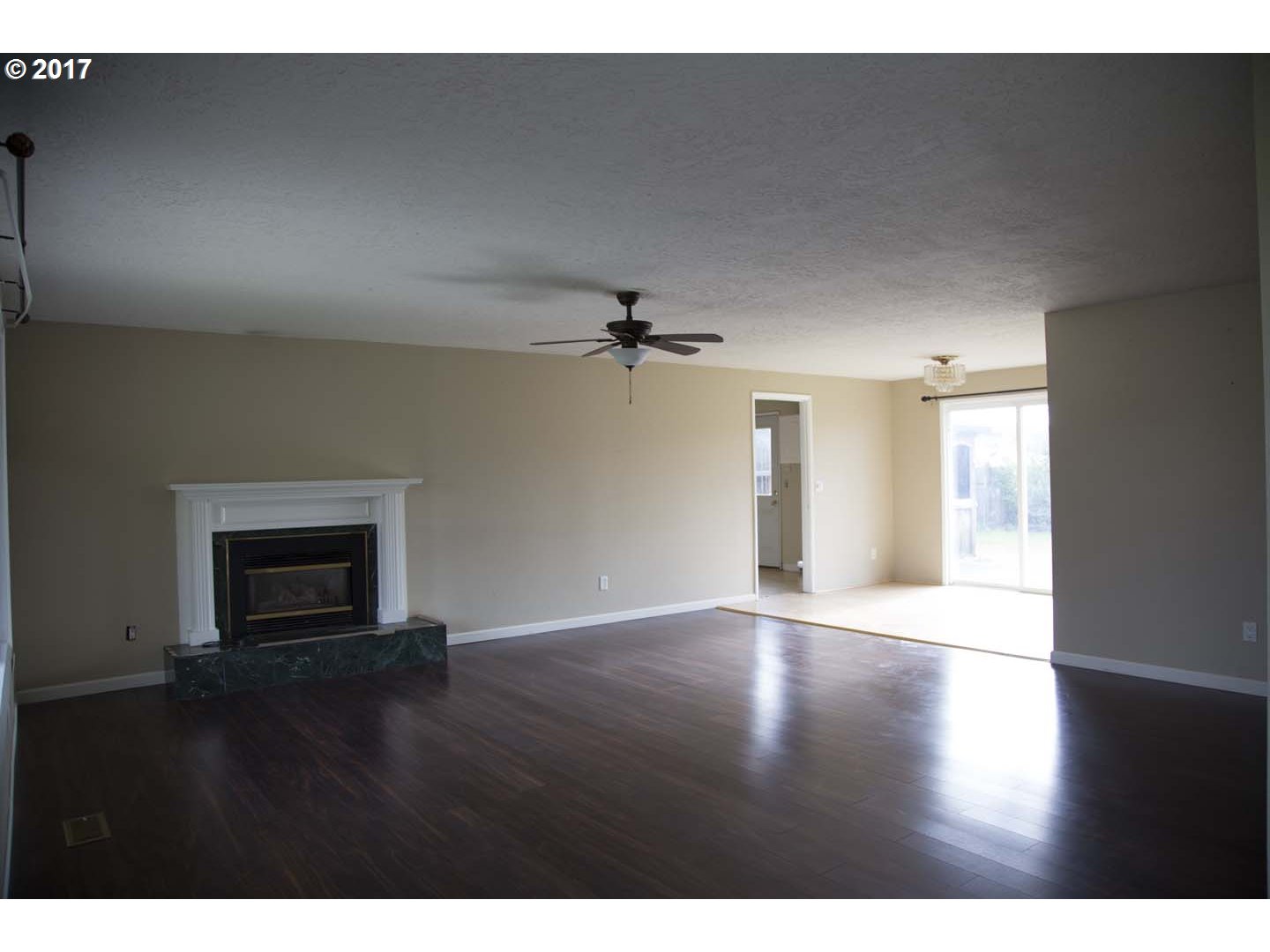 20835 Butteville Road Northeast Donald, OR 97020 - Photo 2 of 14 a view of an empty room with window and wooden floor