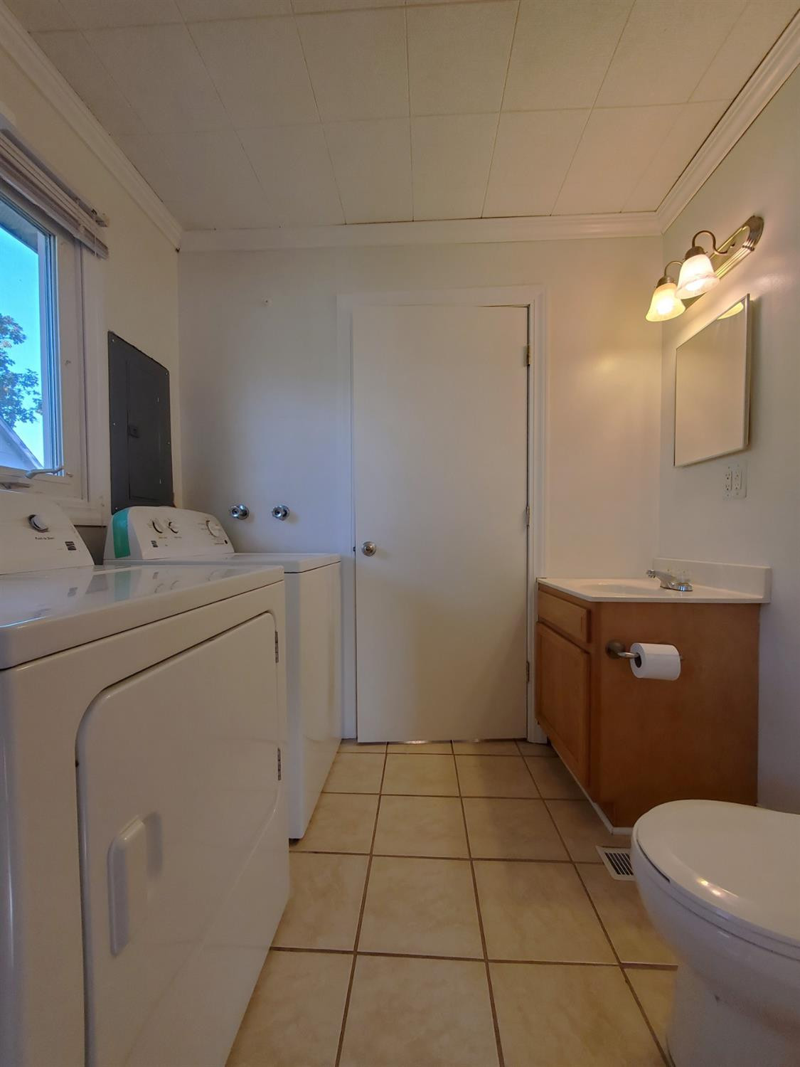722 Fremont Road Valparaiso, IN 46385 - Photo 14 of 17 a bathroom with a sink a toilet and mirror