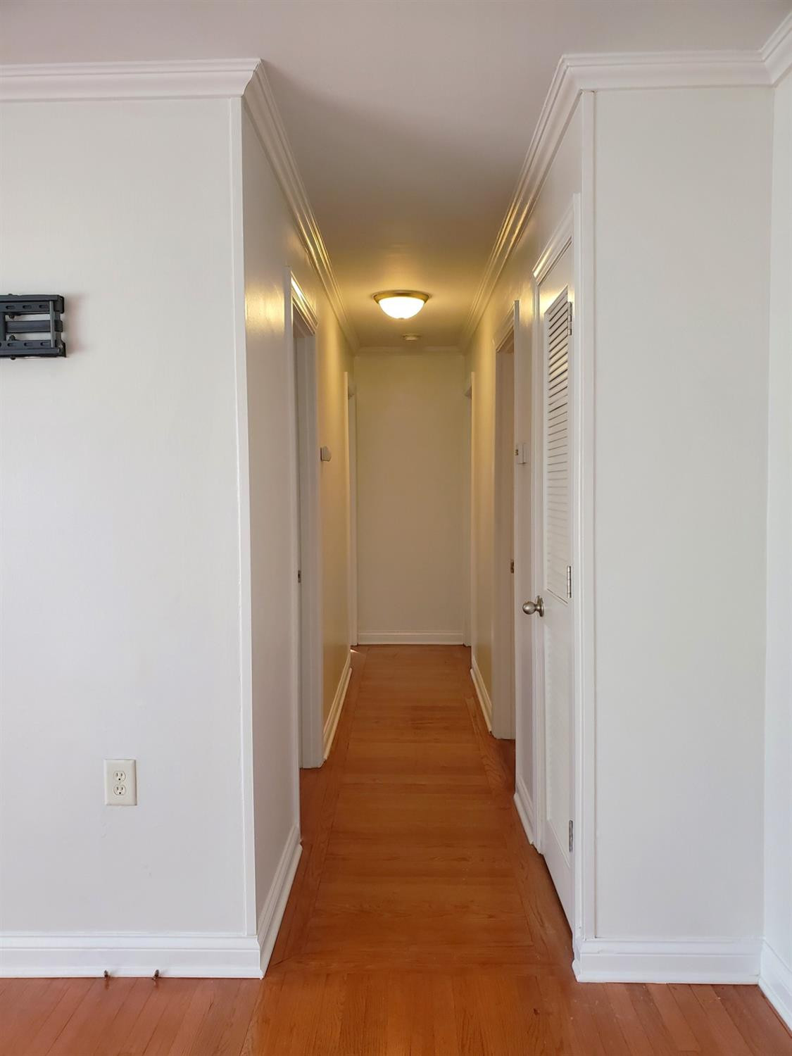 722 Fremont Road Valparaiso, IN 46385 - Photo 8 of 17 a view of a hallway with wooden floor