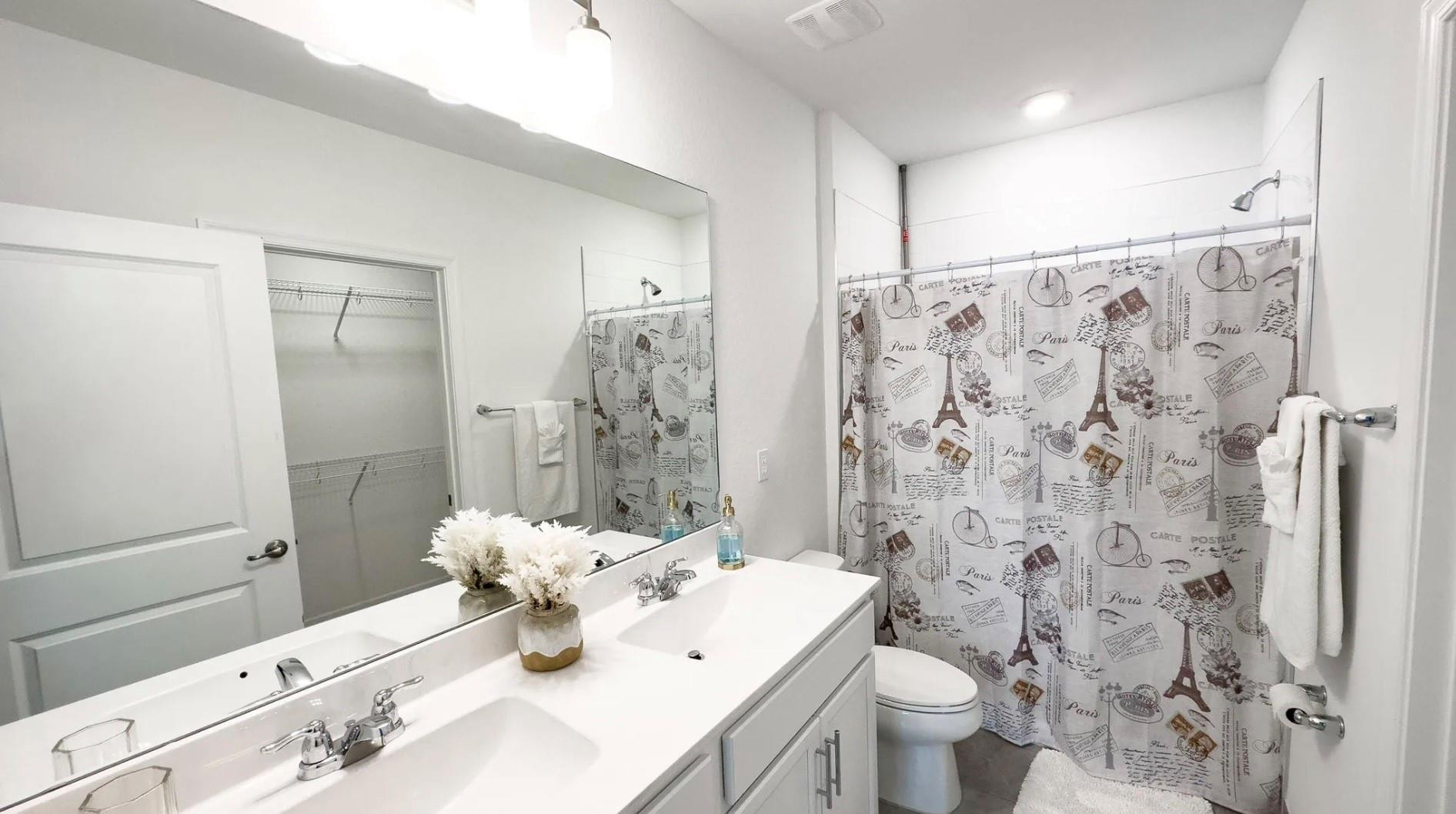 5114 Armina Place Fort Pierce, FL 34951 - Photo 19 of 28 a bathroom with a sink toilet and shower