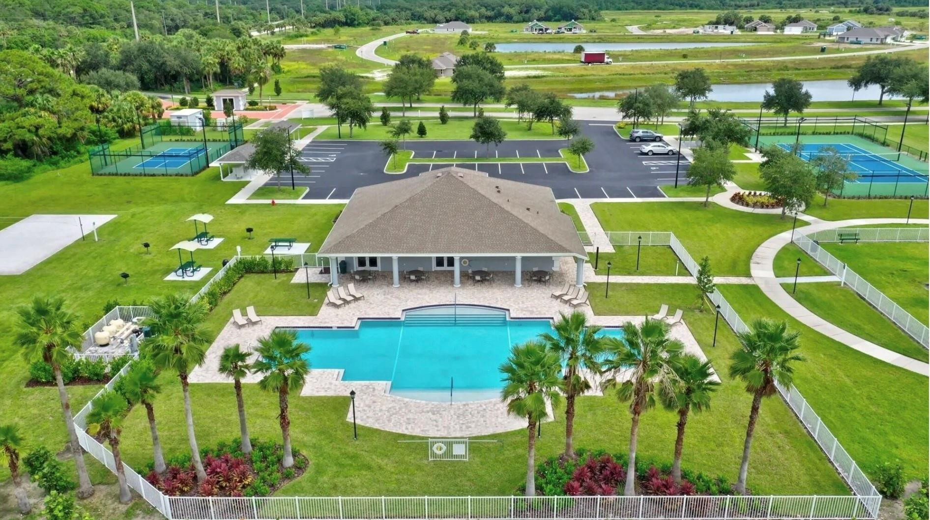 5114 Armina Place Fort Pierce, FL 34951 - Photo 26 of 28 a view of a house with a big yard