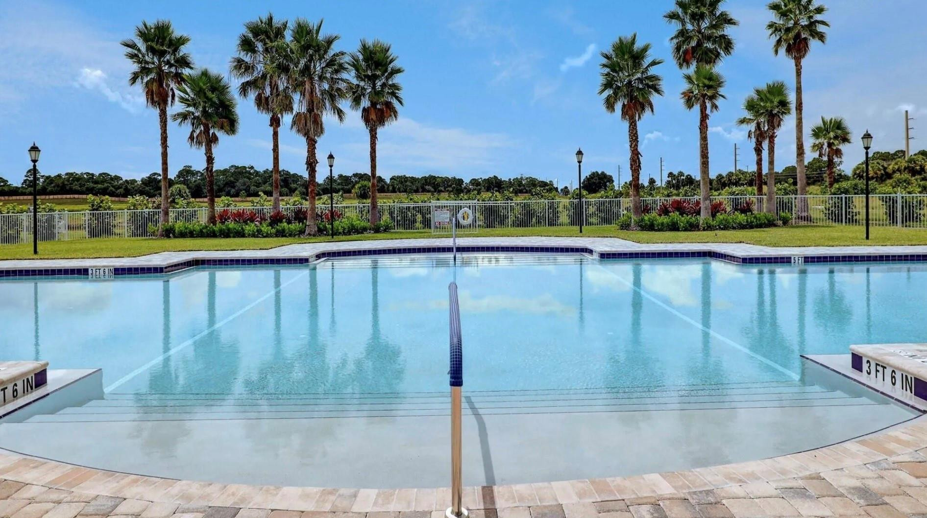5114 Armina Place Fort Pierce, FL 34951 - Photo 27 of 28 a view of a swimming pool and a terrace