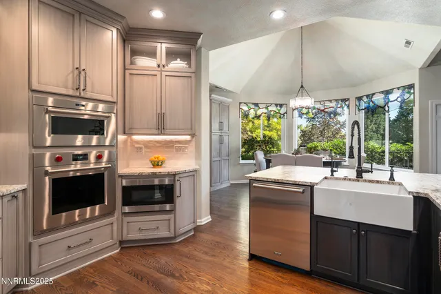 a view of a dining room with furniture window and outside view