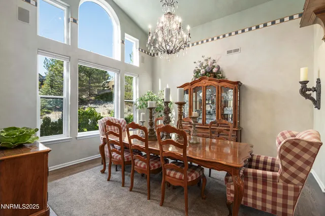 a bedroom with a bed closet and flat tv screen