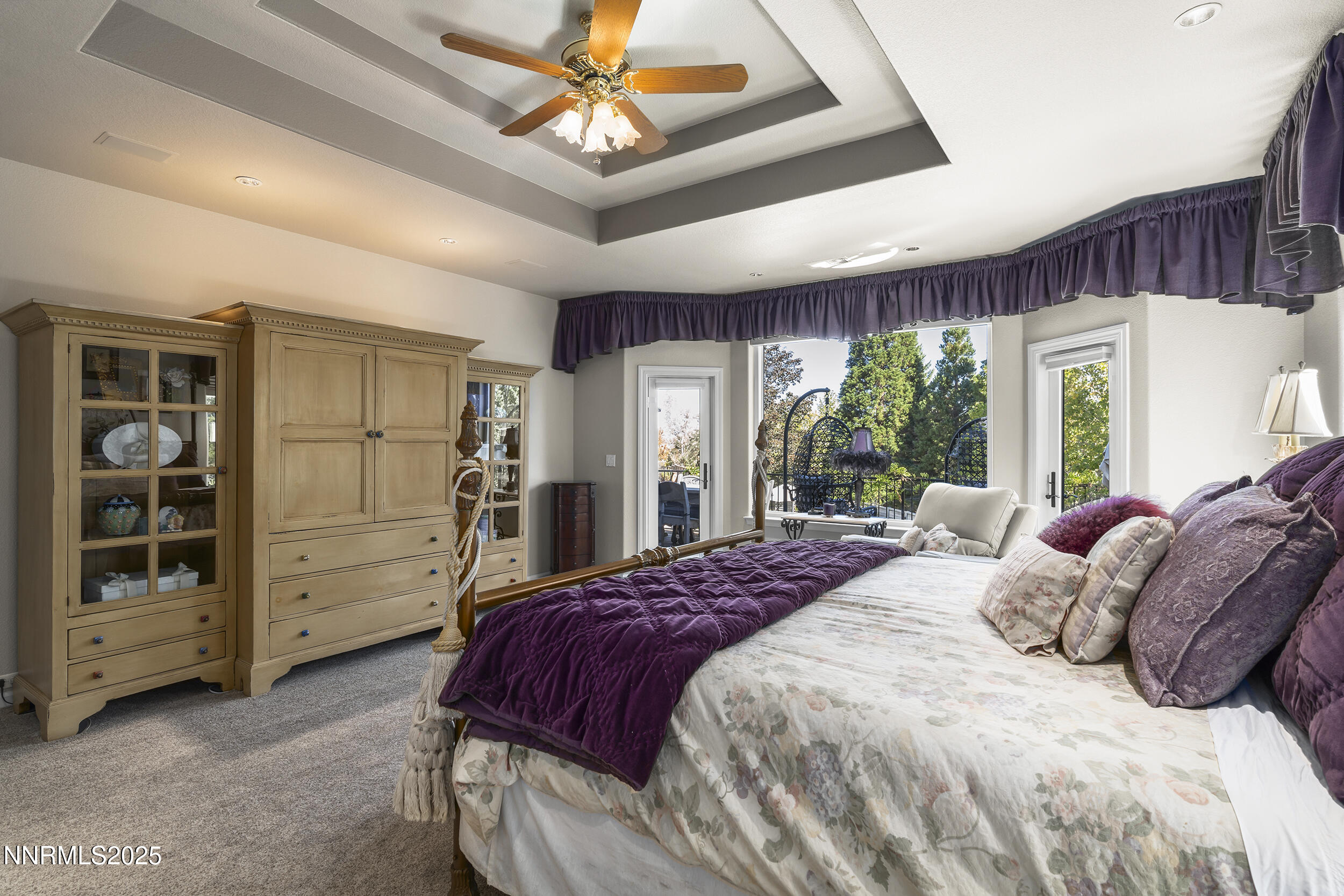 1762 Belford Road Reno, NV 89509 - Photo 16 of 70 a bedroom with a bed closet and flat tv screen