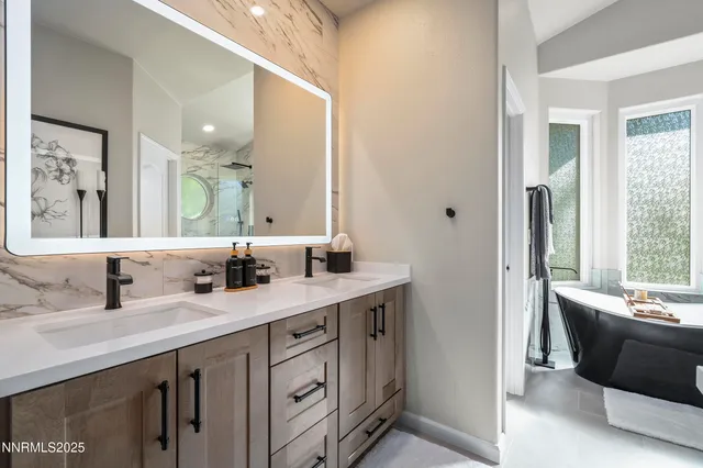 a view of a livingroom with furniture window and outside view
