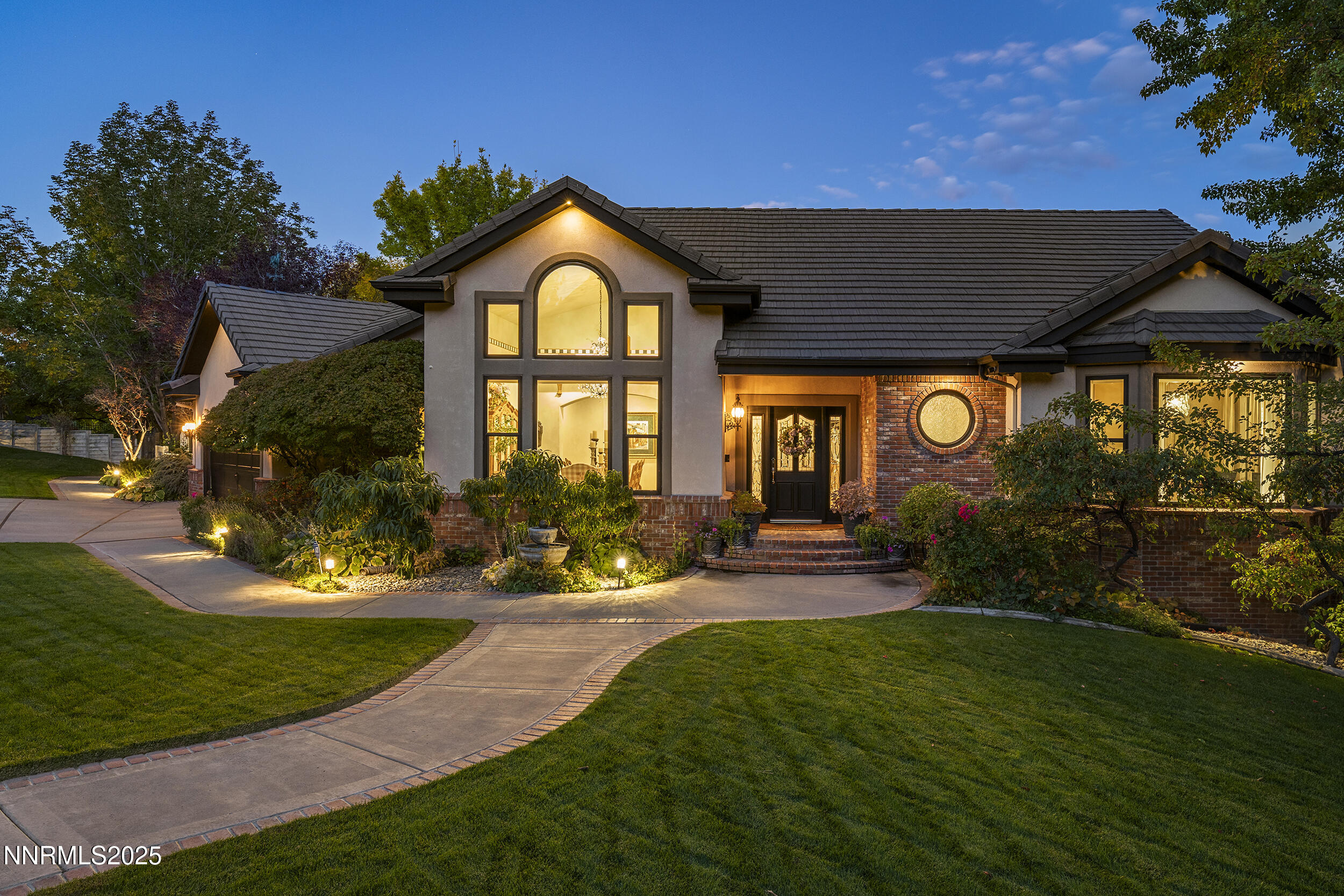 1762 Belford Road Reno, NV 89509 - Photo 2 of 70 a front view of a house with garden