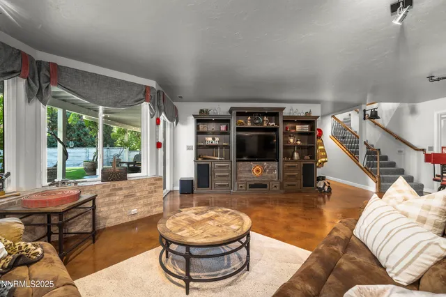 a room with gym equipment and windows