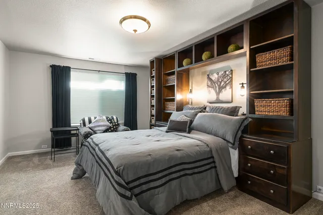 a view of a patio with table and chairs with wooden floor and fence
