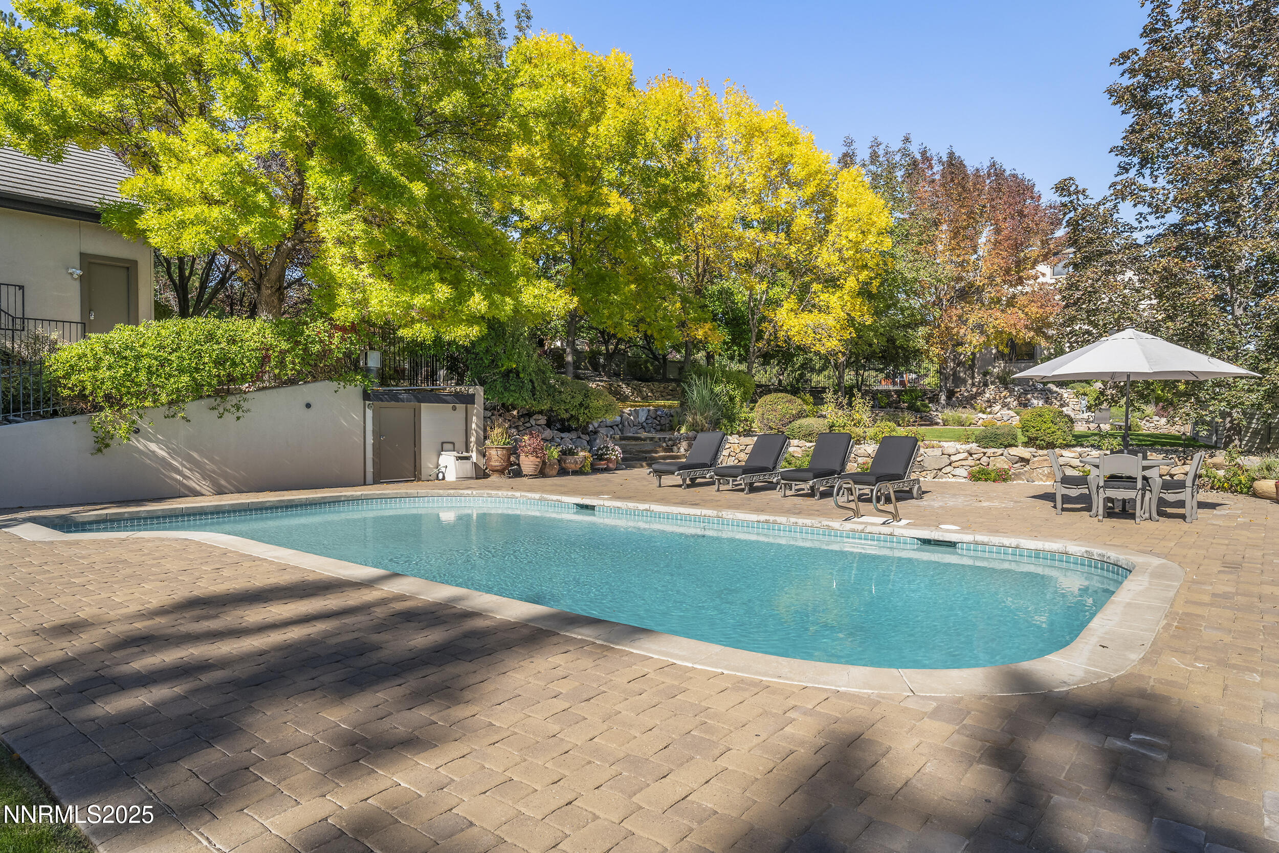 1762 Belford Road Reno, NV 89509 - Photo 41 of 70 a view of a swimming pool with a patio