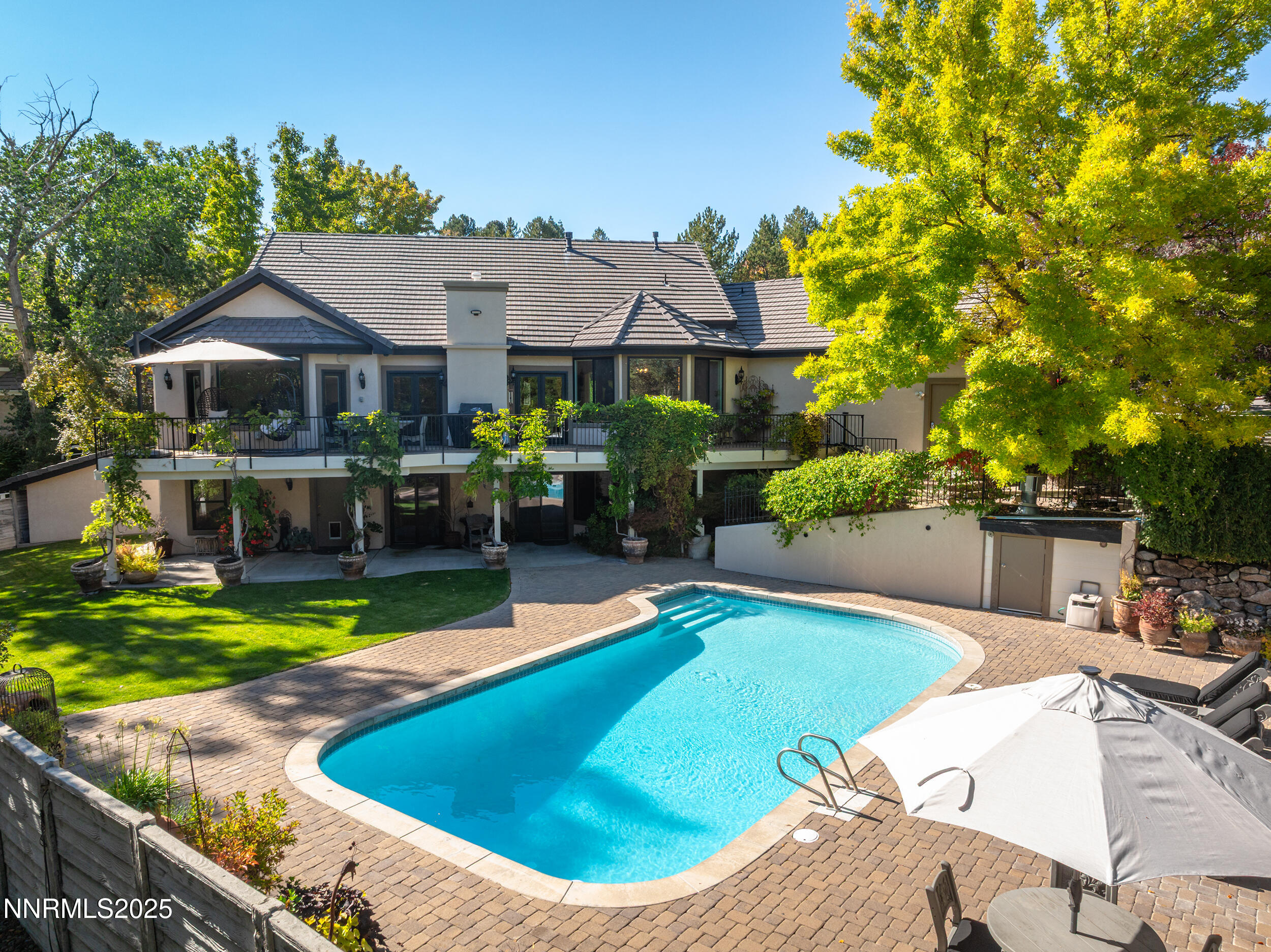 1762 Belford Road Reno, NV 89509 - Photo 43 of 70 a view of a house with swimming pool and sitting area
