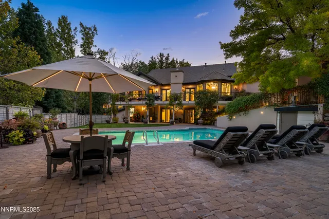 a view of a park with large trees