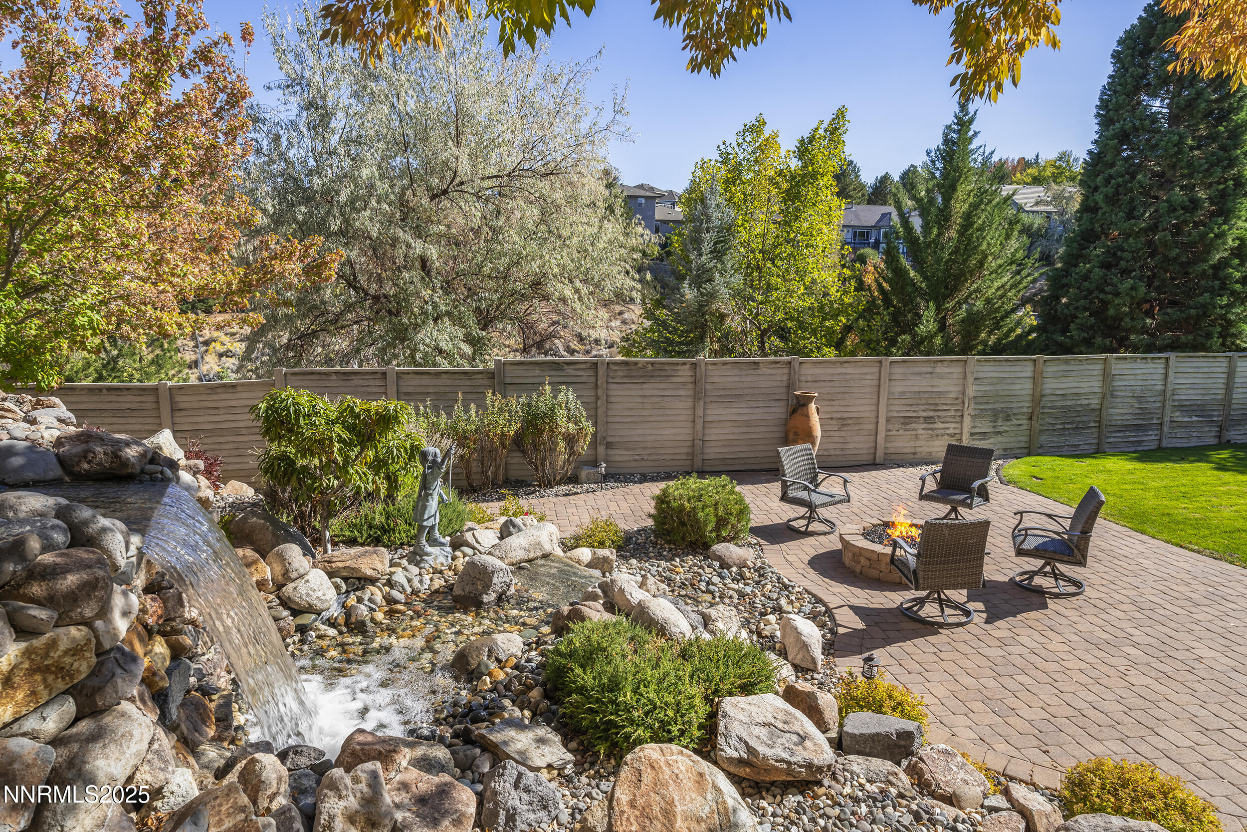 1762 Belford Road Reno, NV 89509 - Photo 55 of 70 a view of a backyard with plants and a patio