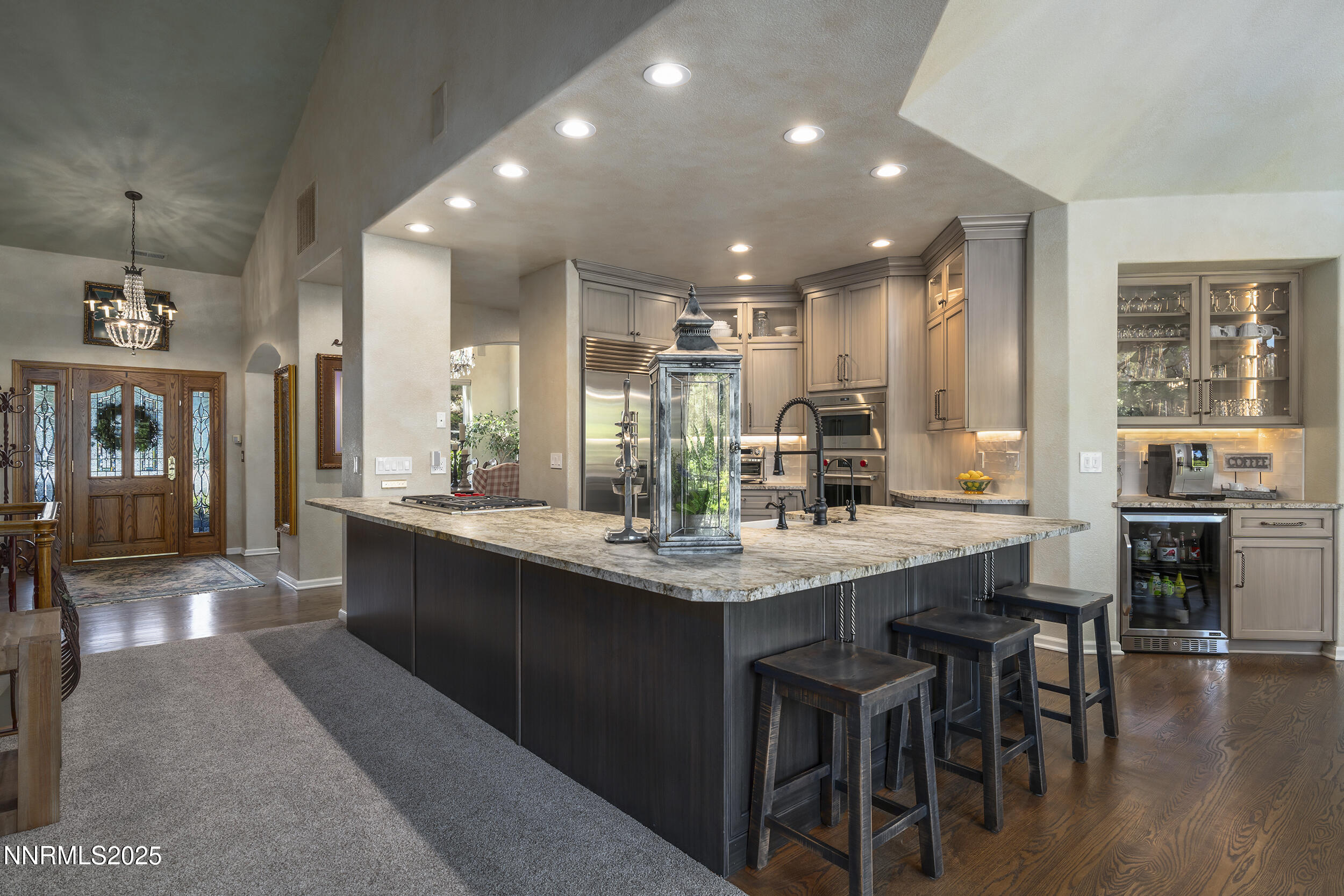 1762 Belford Road Reno, NV 89509 - Photo 10 of 70 a kitchen with kitchen island granite countertop a sink and stove