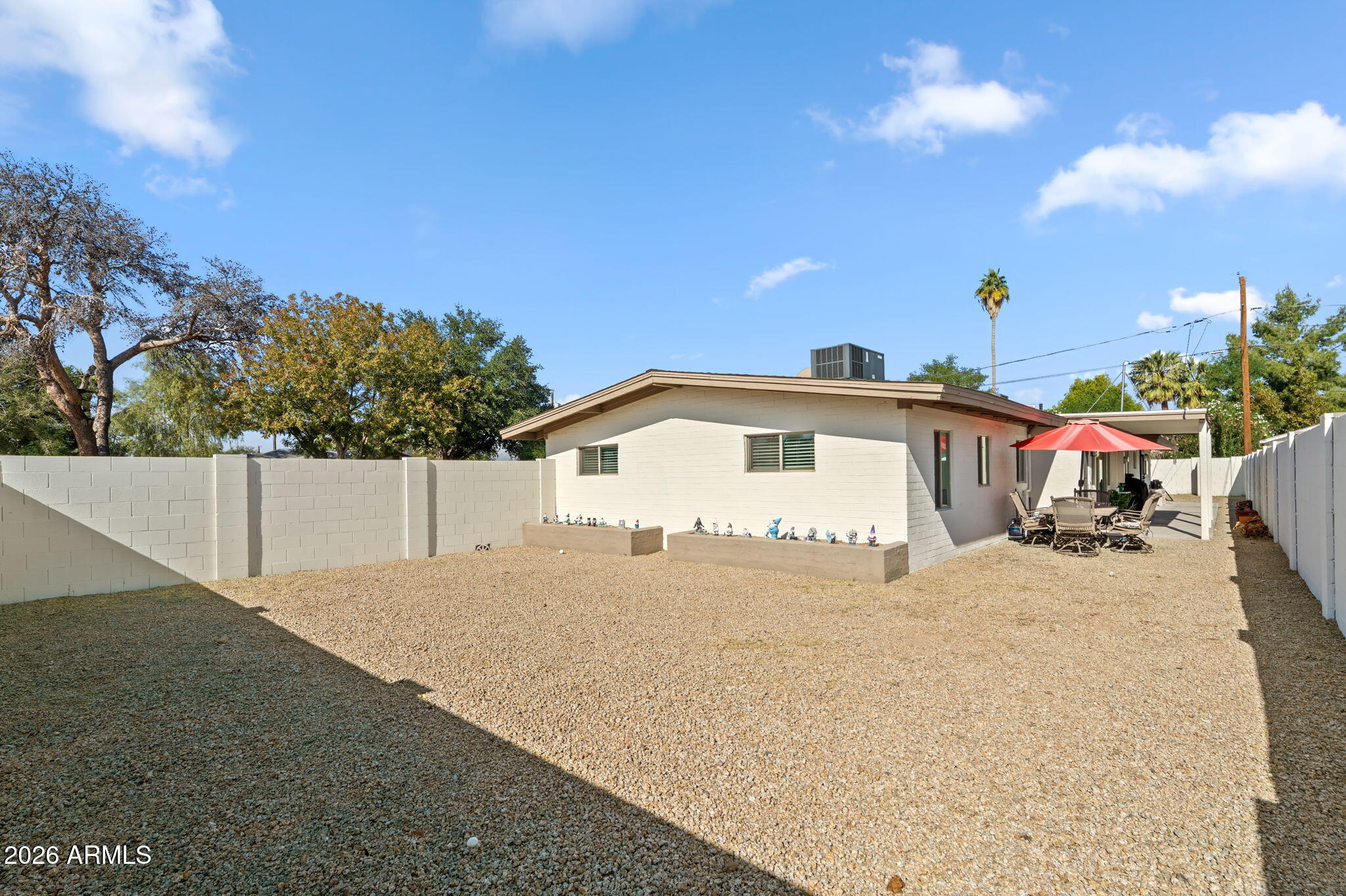 3901 North 19th Street Phoenix, AZ 85016 - Photo 17 of 20 a white house that has a tree in front of it