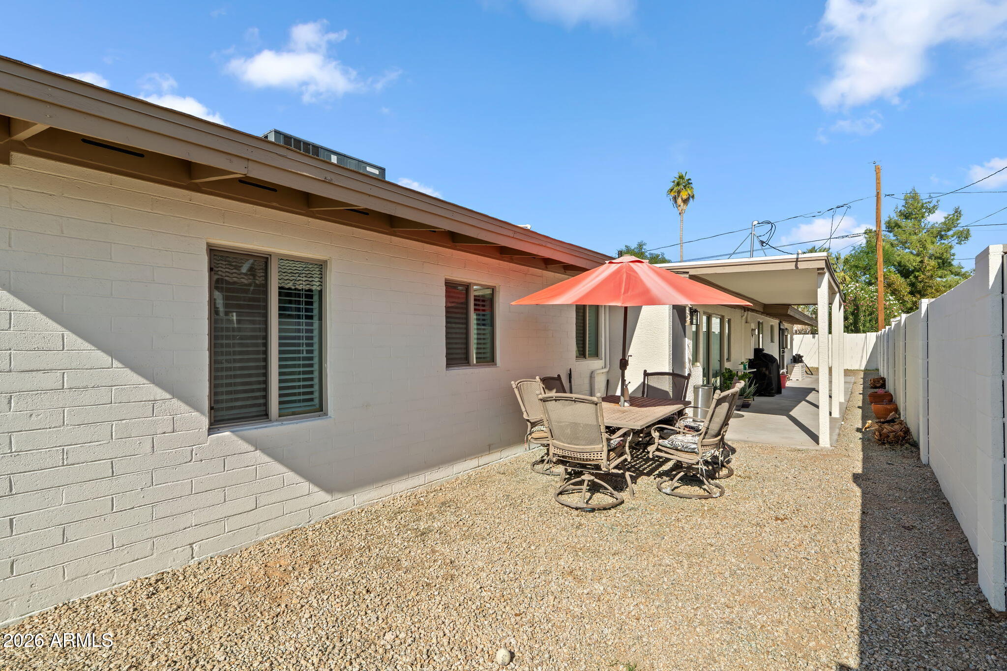 3901 North 19th Street Phoenix, AZ 85016 - Photo 18 of 20 a patio with table and chairs