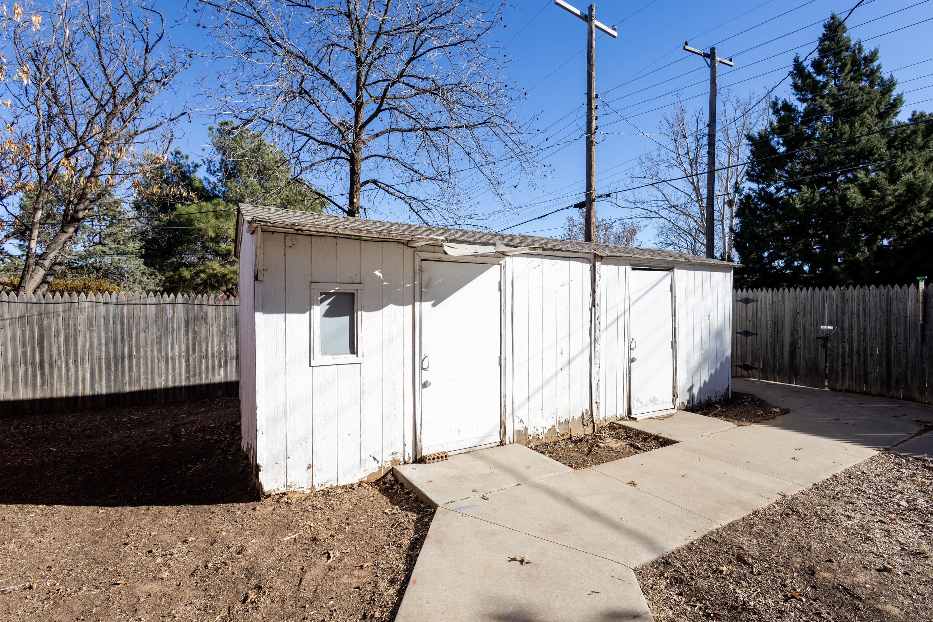 5323 31st Street Lubbock, TX 79407 - Photo 27 of 28 a view of a backyard of a house