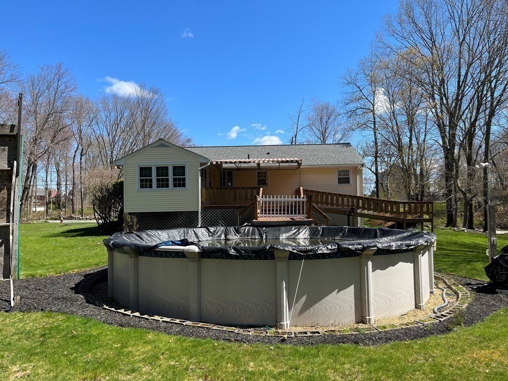 148 Hartness Road Sutton, MA 01590 - Photo 7 of 27 a view of a house with backyard