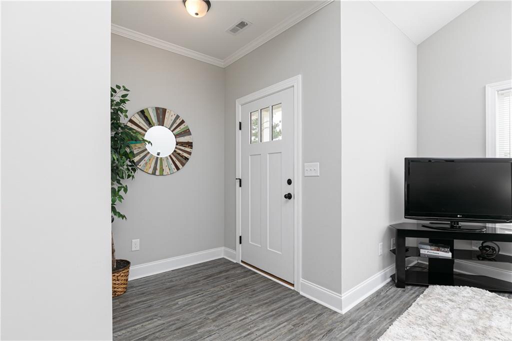 59 Calloway Lane Cartersville, GA 30120 - Photo 4 of 29 a living room with furniture and a flat screen tv