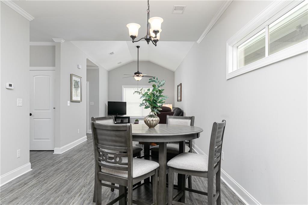 59 Calloway Lane Cartersville, GA 30120 - Photo 7 of 29 a view of a dining room with furniture and wooden floor