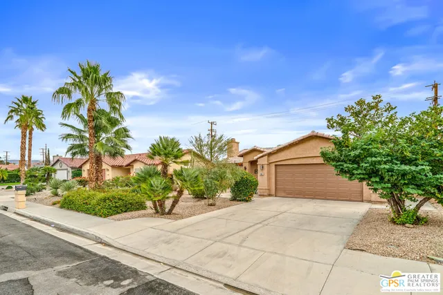 a plant in front of a house