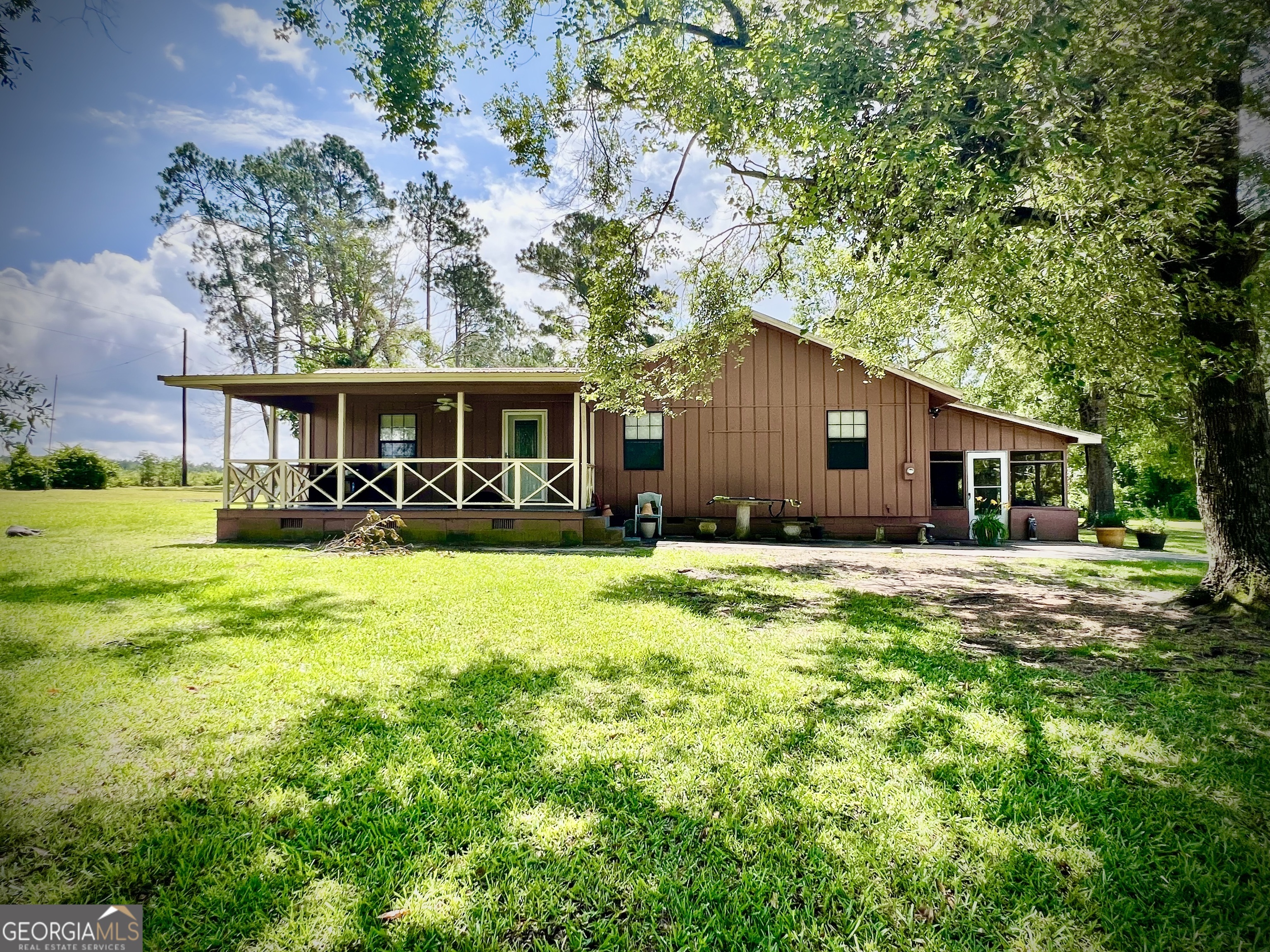 a view of a house with a big yard
