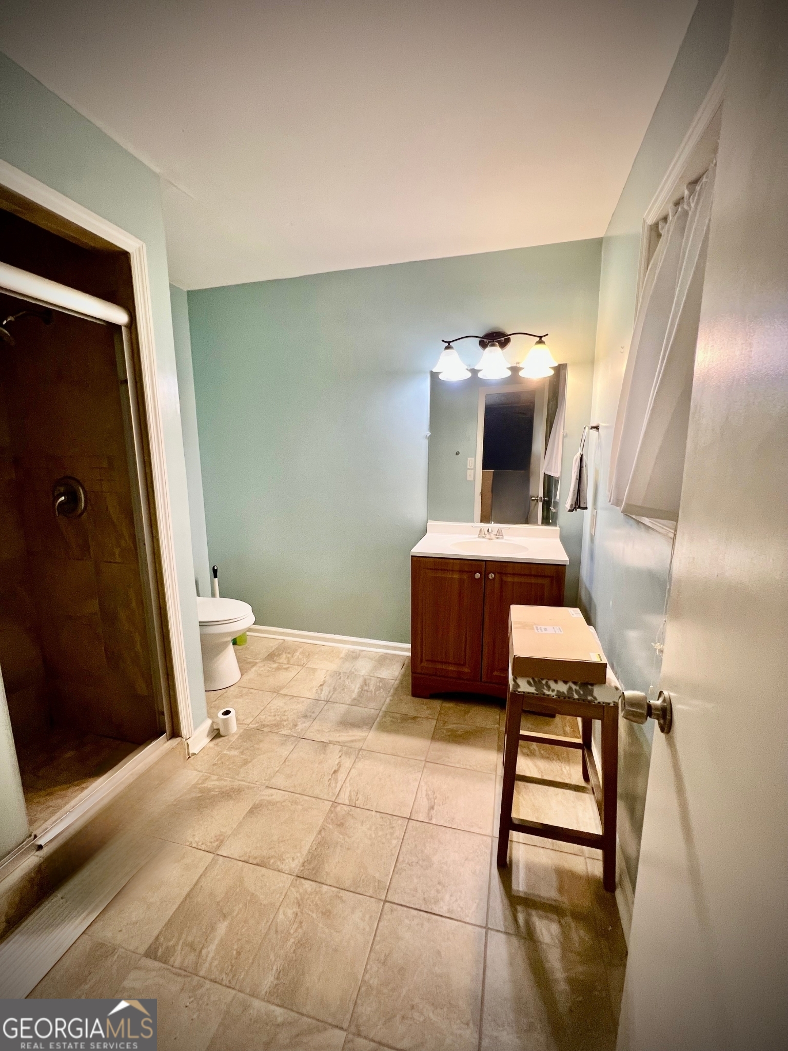 2618 Highway 86 Adrian, GA 31002 - Photo 19 of 27 a living room with a couch and a table