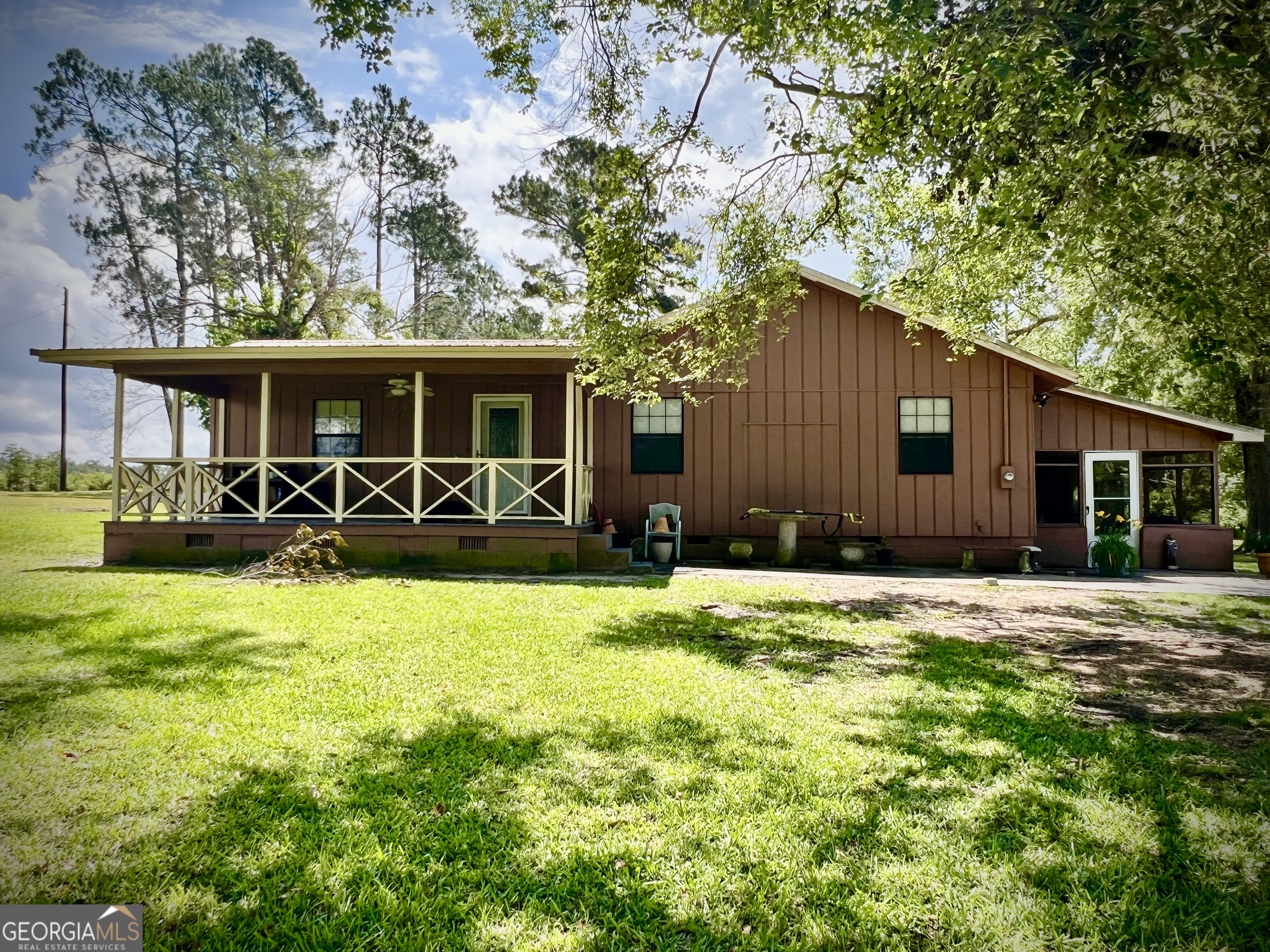 2618 Highway 86 Adrian, GA 31002 - Photo 20 of 27 a front view of house with yard and trees in the background