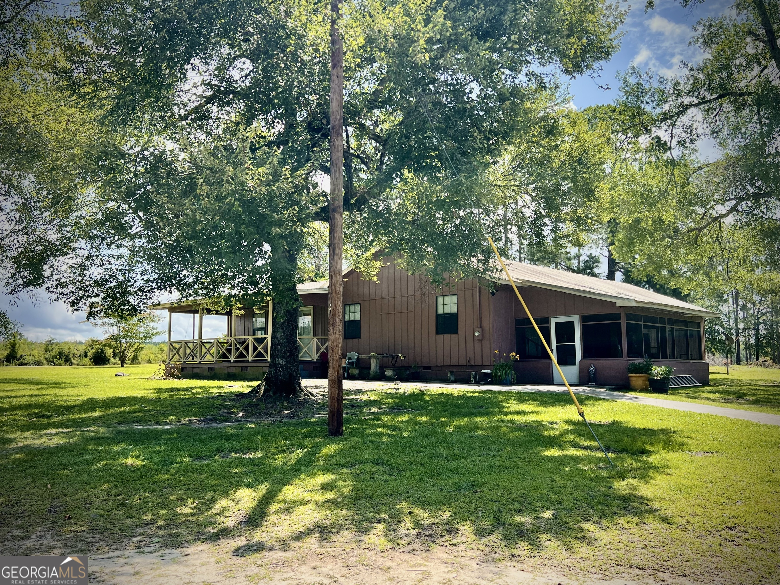 2618 Highway 86 Adrian, GA 31002 - Photo 21 of 27 a view of a house with a swimming pool