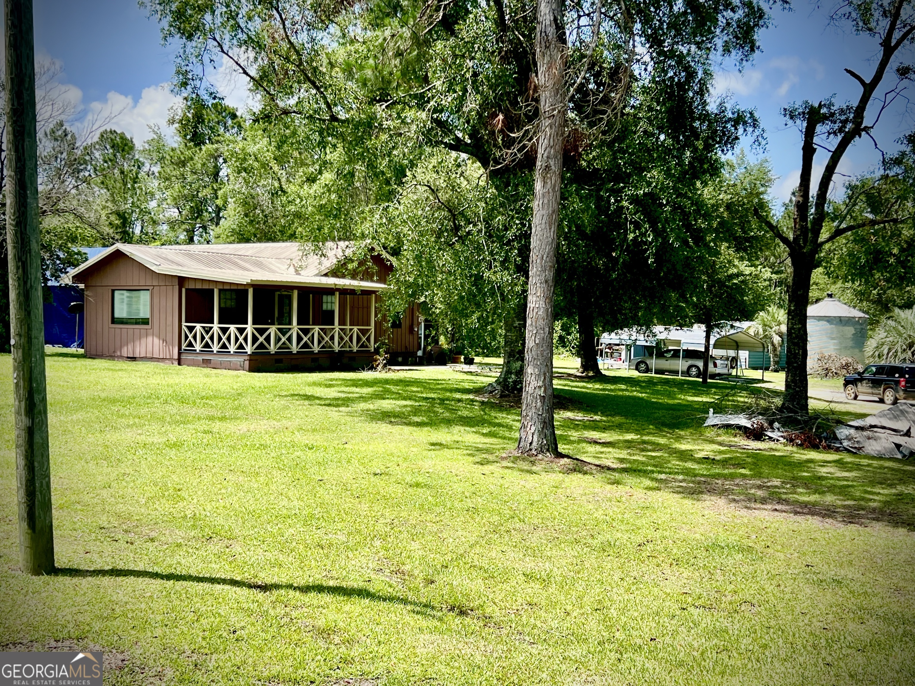 2618 Highway 86 Adrian, GA 31002 - Photo 24 of 27 a view of house with a yard