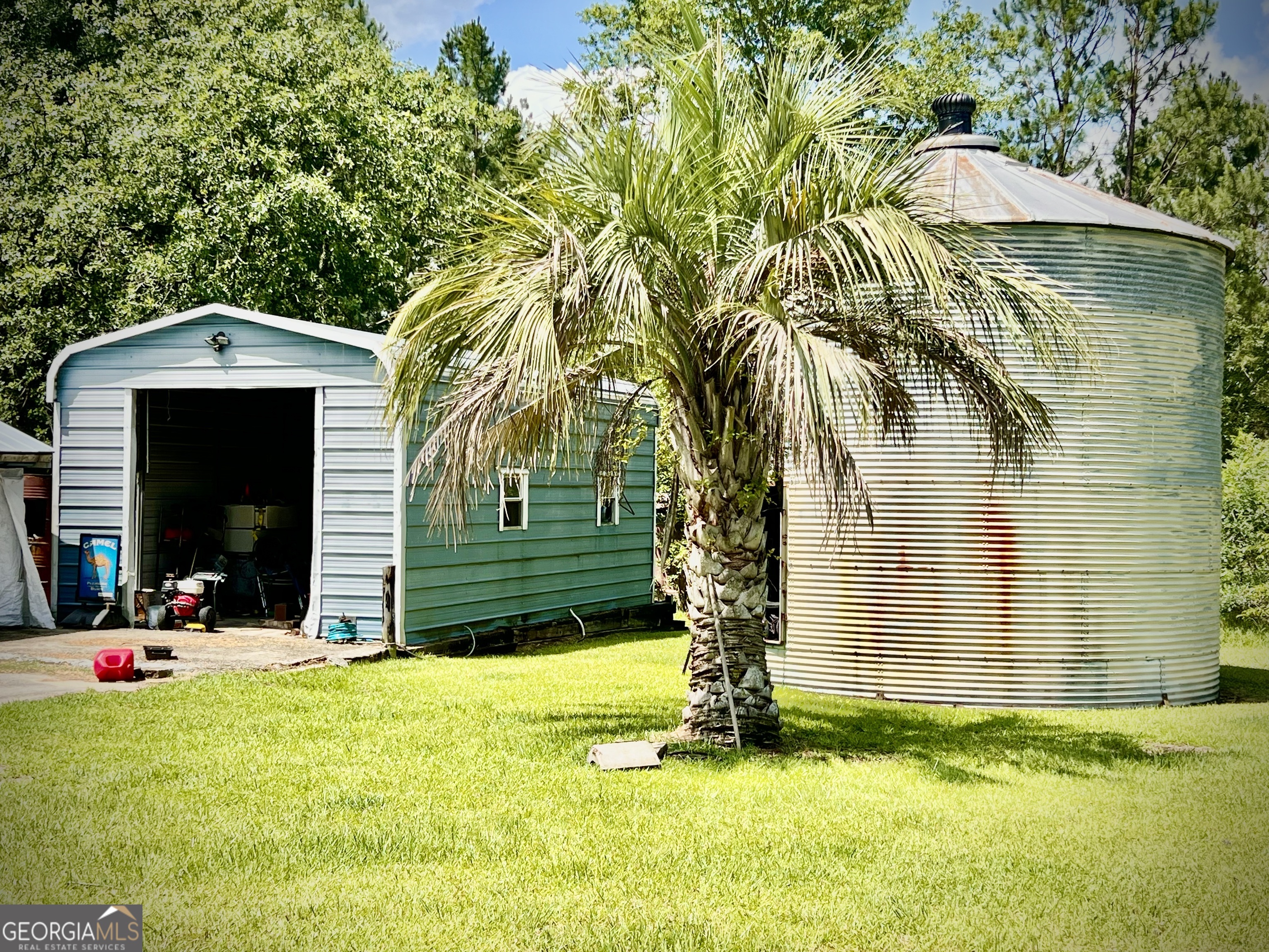 2618 Highway 86 Adrian, GA 31002 - Photo 5 of 27 a front view of a house with a yard