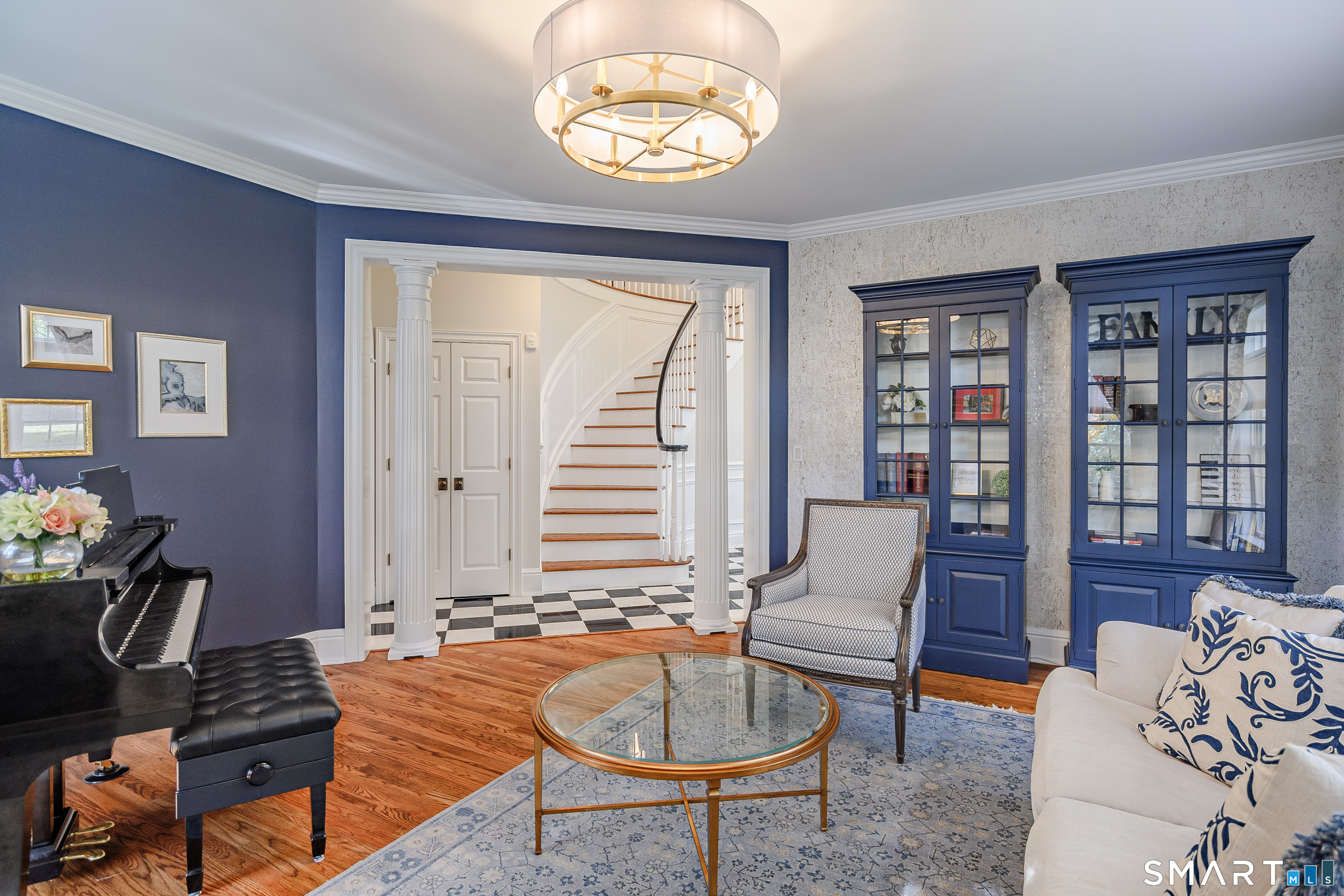 14 Merlins Lane Newtown, CT 06470 - Photo 11 of 40 Elegant living space with custom built-ins and columned entry.